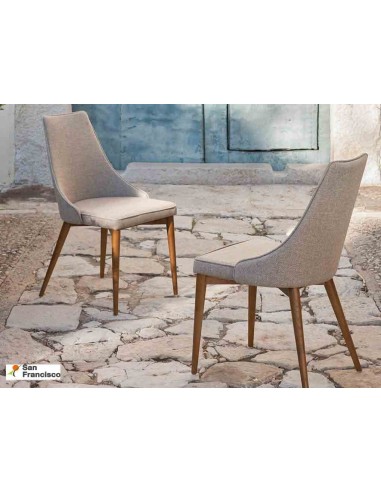 Silla de comedor tapizada con patas de Nogal