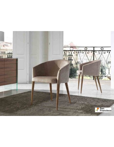 Sillón tapizado con patas de Nogal